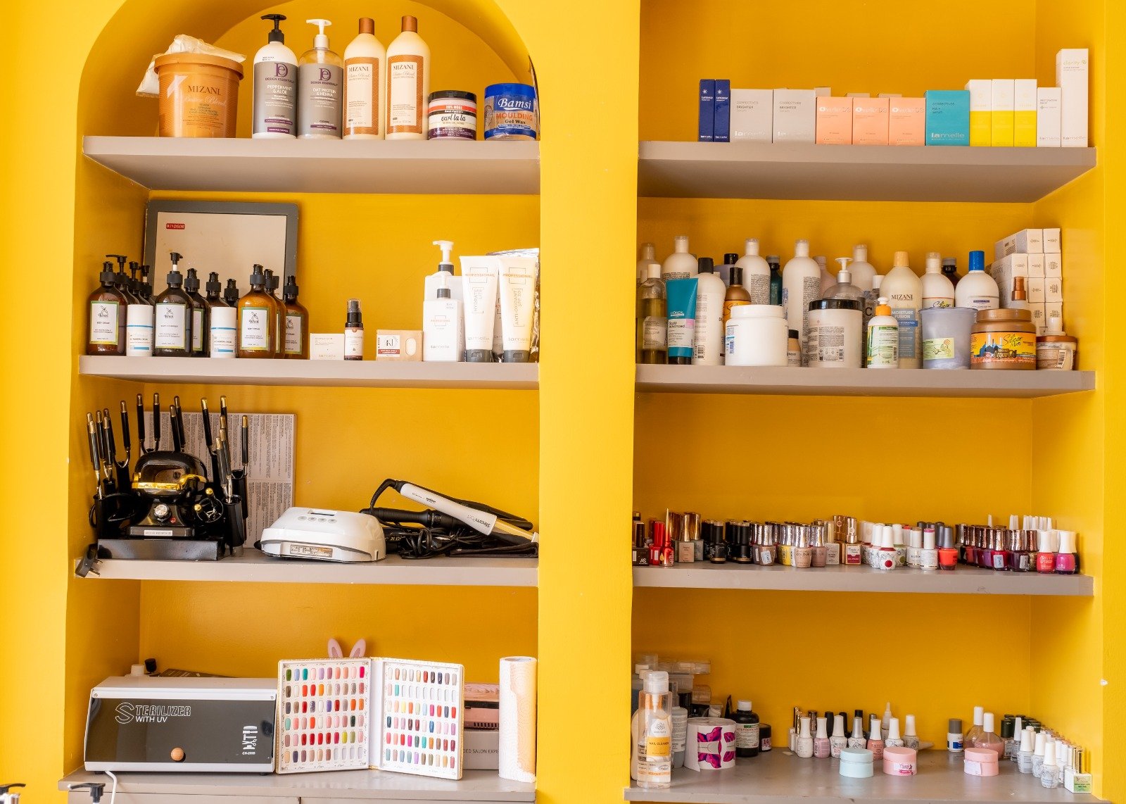 The retail corner — full product line-up on the arched shelving